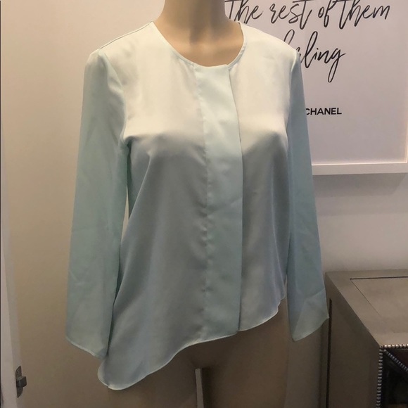 H&M Tops - Cute A Symmetrical light blue H&M blouse